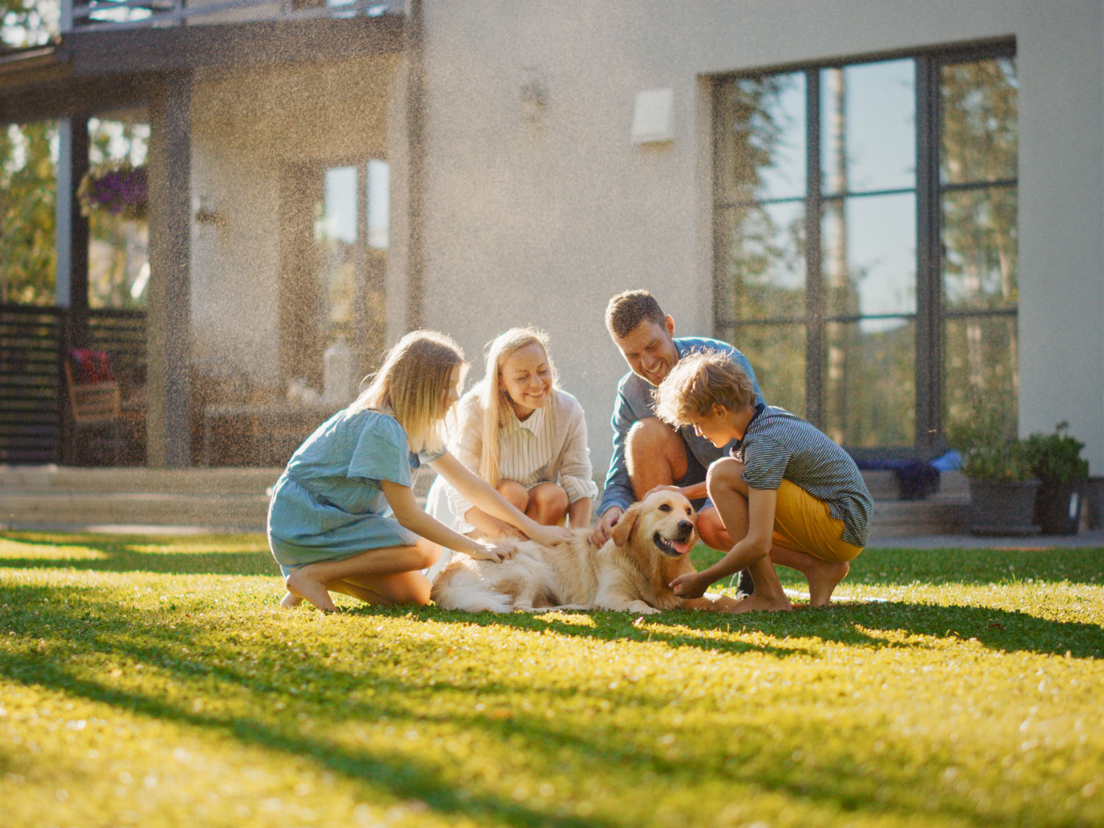 A family gathered around their dog